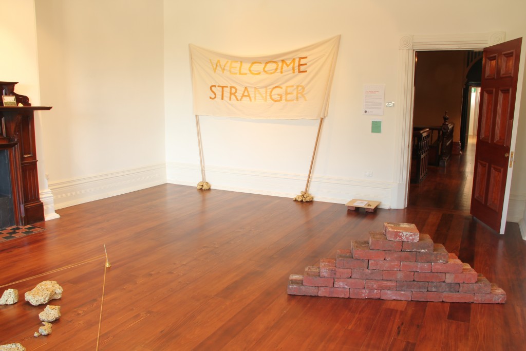 Welcome Stranger Banner and Bricks